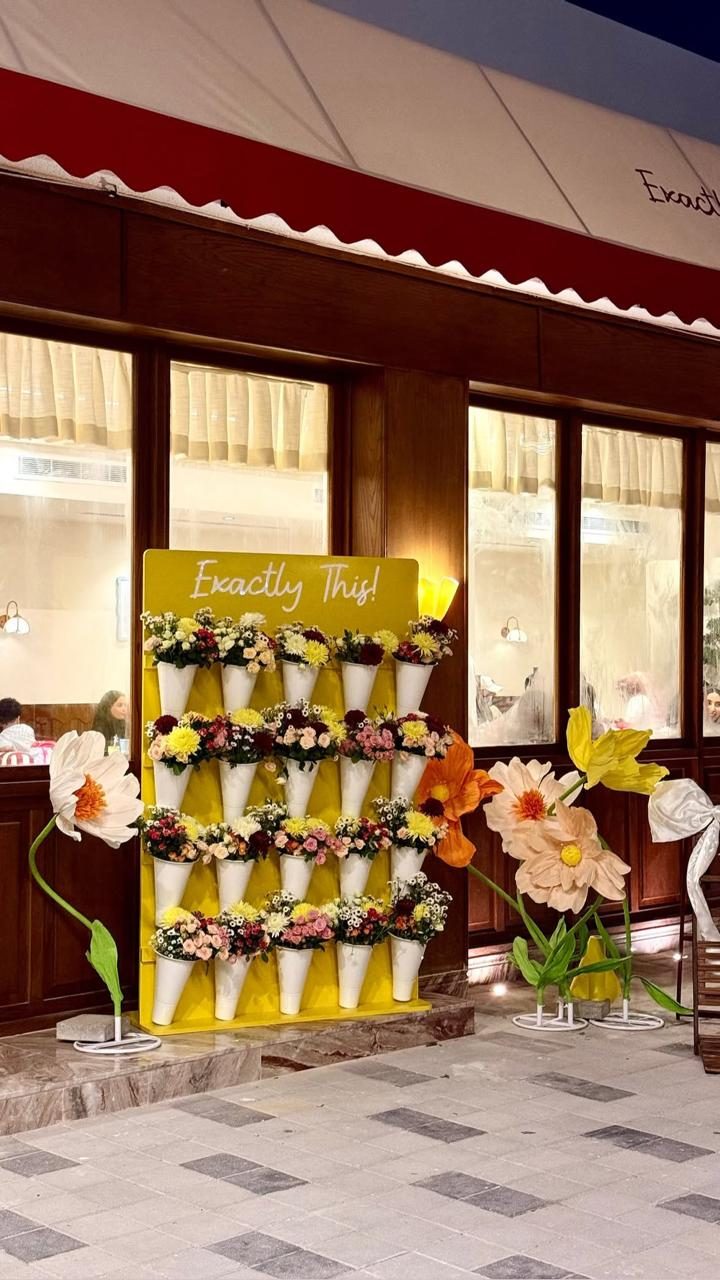 Exactly This storefront flower display